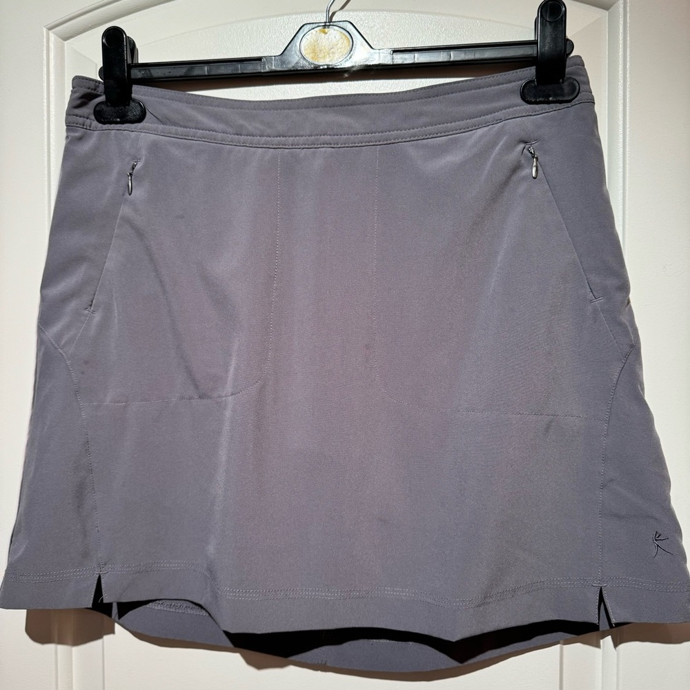 DANSKIN. Grey Gym Skort. Zipper pockets on each‎ side. Two back pockets.S…